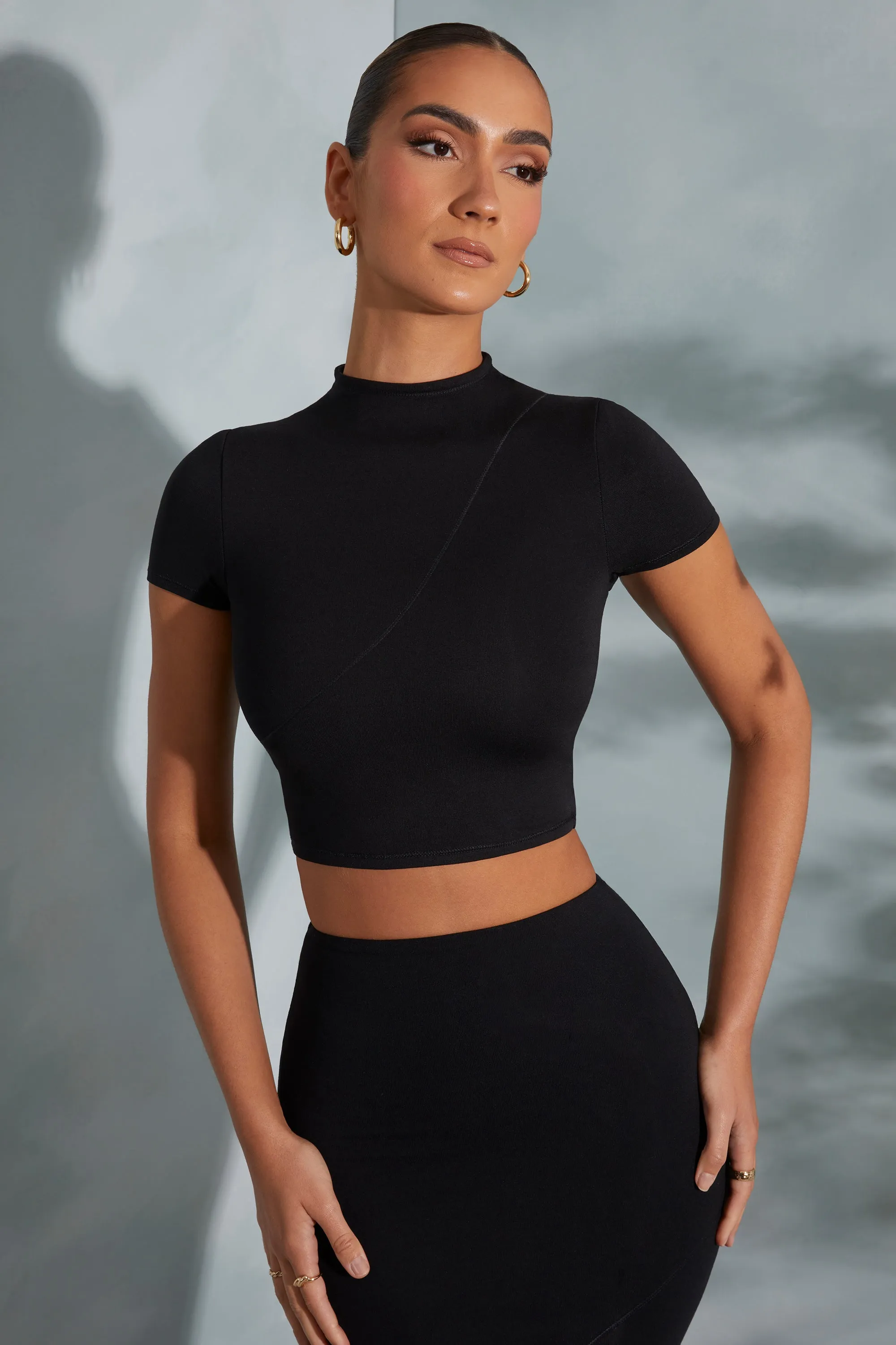 Contrast Stitch Turtleneck Crop Top in Black